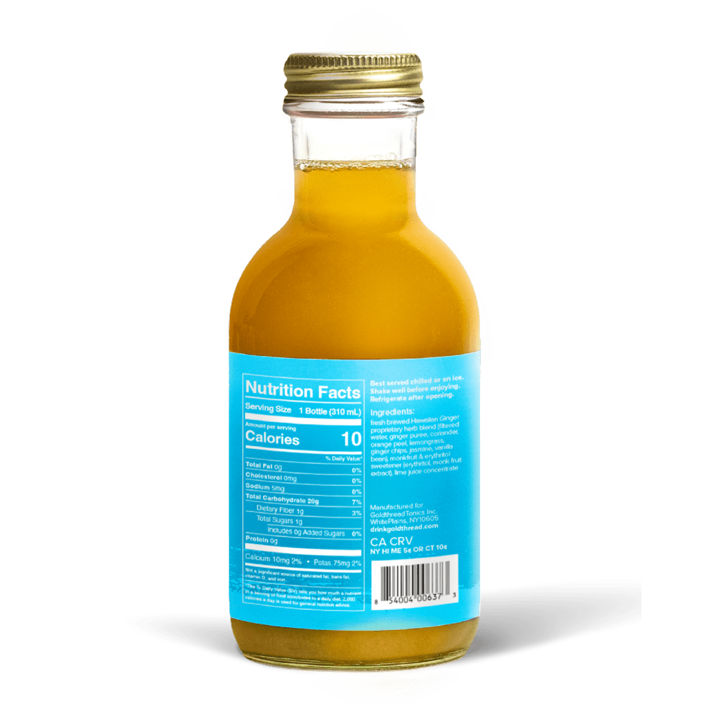 A glass bottle with a gold cap containing 10.5 fl oz (300 ml) of orange liquid. The blue label identifies the drink as Goldthread's Hawaiian Ginger plant-based tonic and features text reading "Activate Digestion and Circulation".