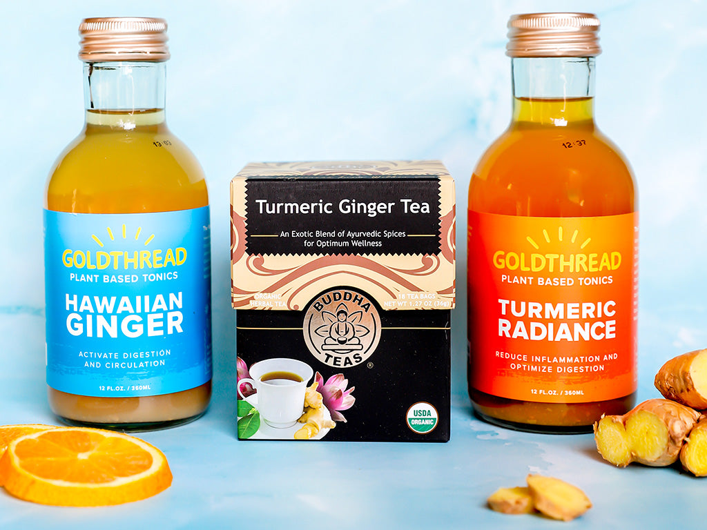 Goldthread Tonics Hawaiian Ginger and Turmeric Radiance Tonics and Buddha Teas Turmeric Ginger Tea with orange slices and ginger sitting next to the products