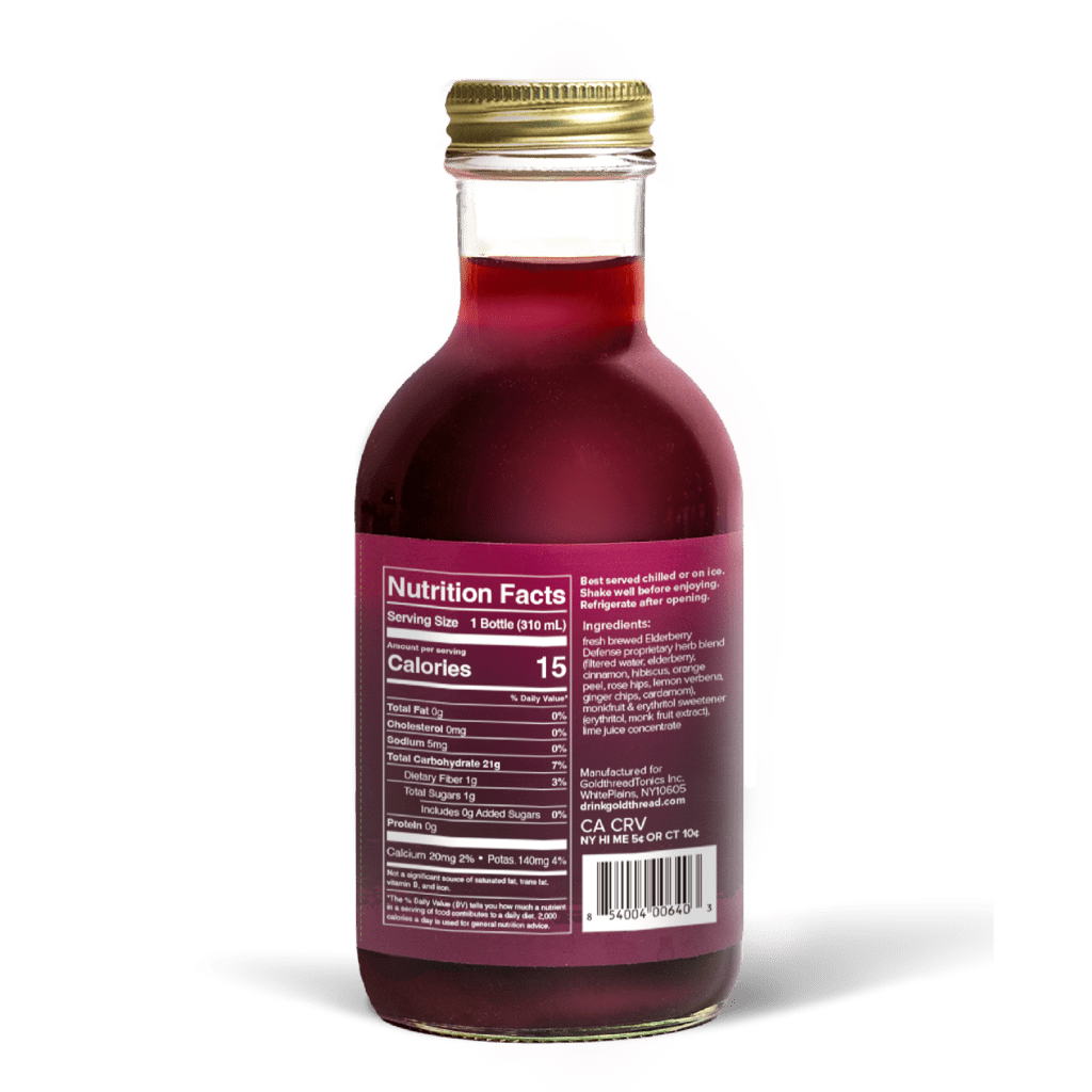 A glass bottle with a gold cap containing 10.5 fl oz (300 ml) of purple liquid. The purple label identifies the drink as Goldthread's Elderberry Defense plant-based tonic and features text reading "Boost Immunity and Carry On".