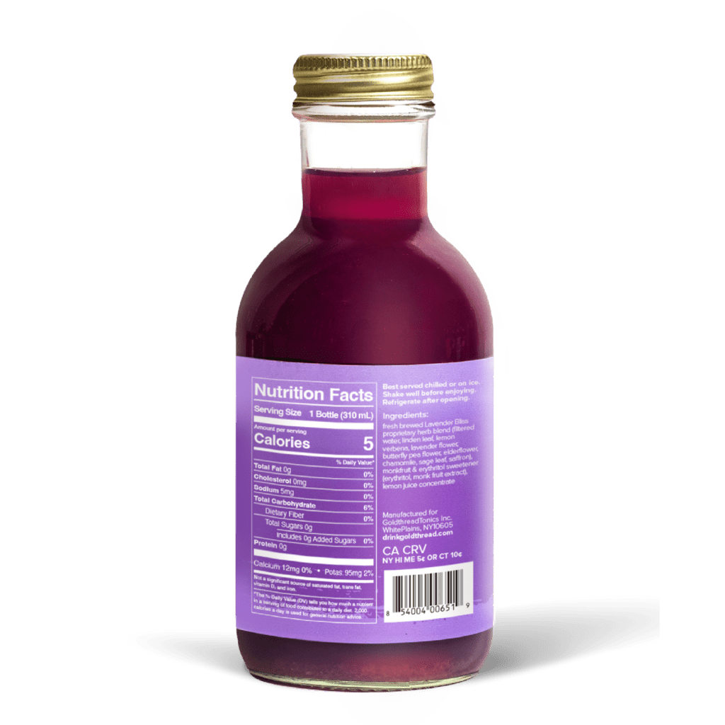 A glass bottle with a gold cap containing 10.5 fl oz (300 ml) of purple liquid. The purple label identifies the drink as Goldthread's Lavender Bliss plant-based tonic and features text reading "Calm Nerves and Reduce Stress".