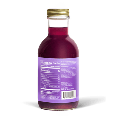 A glass bottle with a gold cap containing 10.5 fl oz (300 ml) of purple liquid. The purple label identifies the drink as Goldthread's Lavender Bliss plant-based tonic and features text reading "Calm Nerves and Reduce Stress".